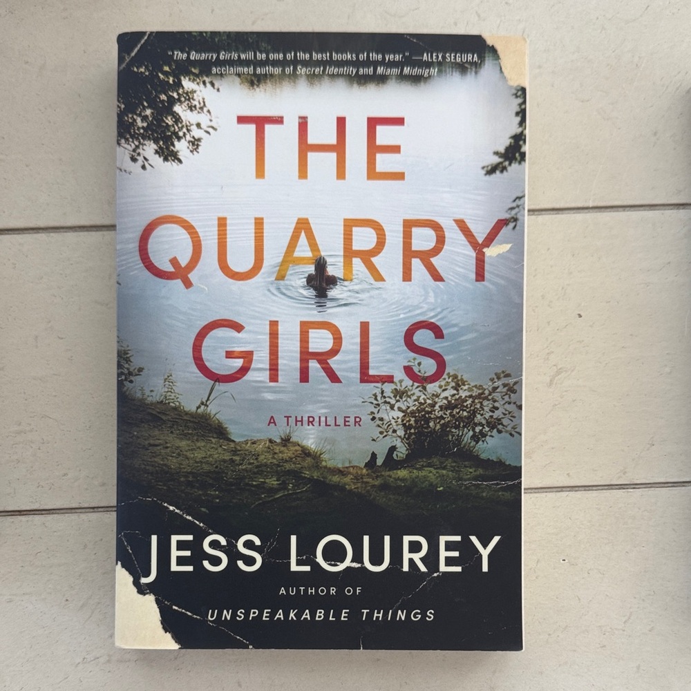 The Quarry Girls by Jess Lourey – Paperback Thriller, Blue/Black/Cream Cover